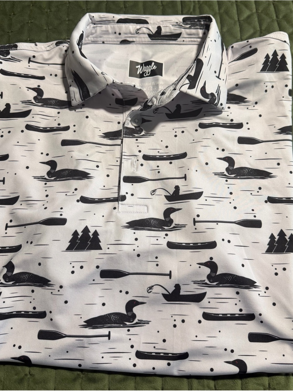 Waggle "Loon Lake" polo white with black loons, canoes, and trees. Size medium